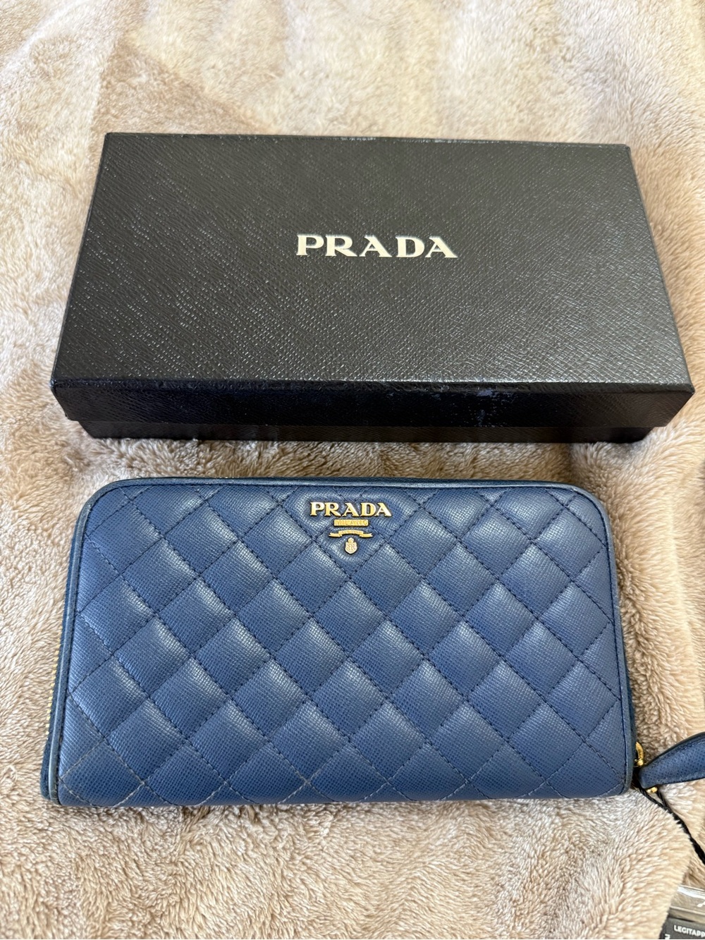 Prada Quilted Leather Zip Wallet – Blue with Gold Hardware
